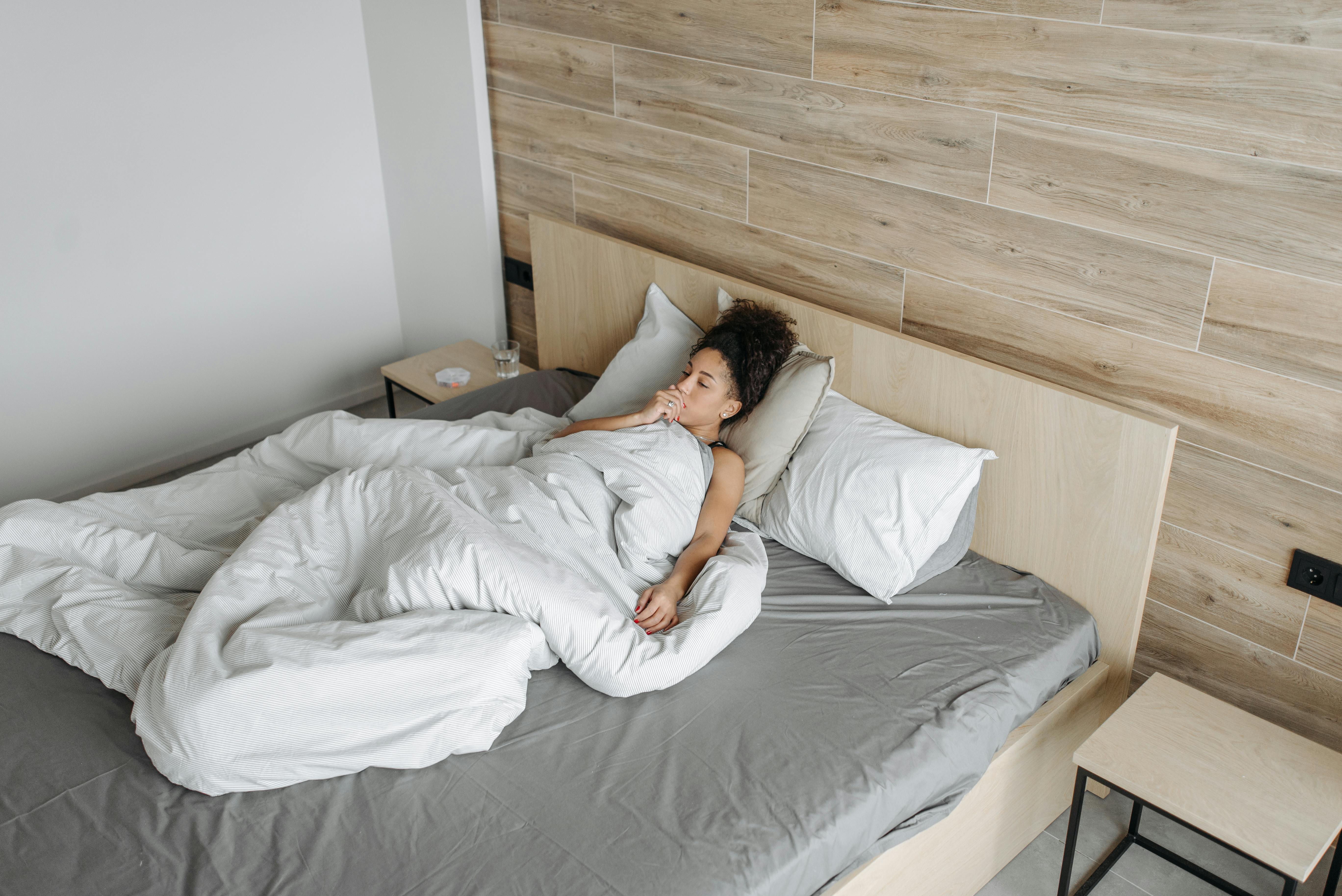 Free Sick Woman On The Bed Stock Photo