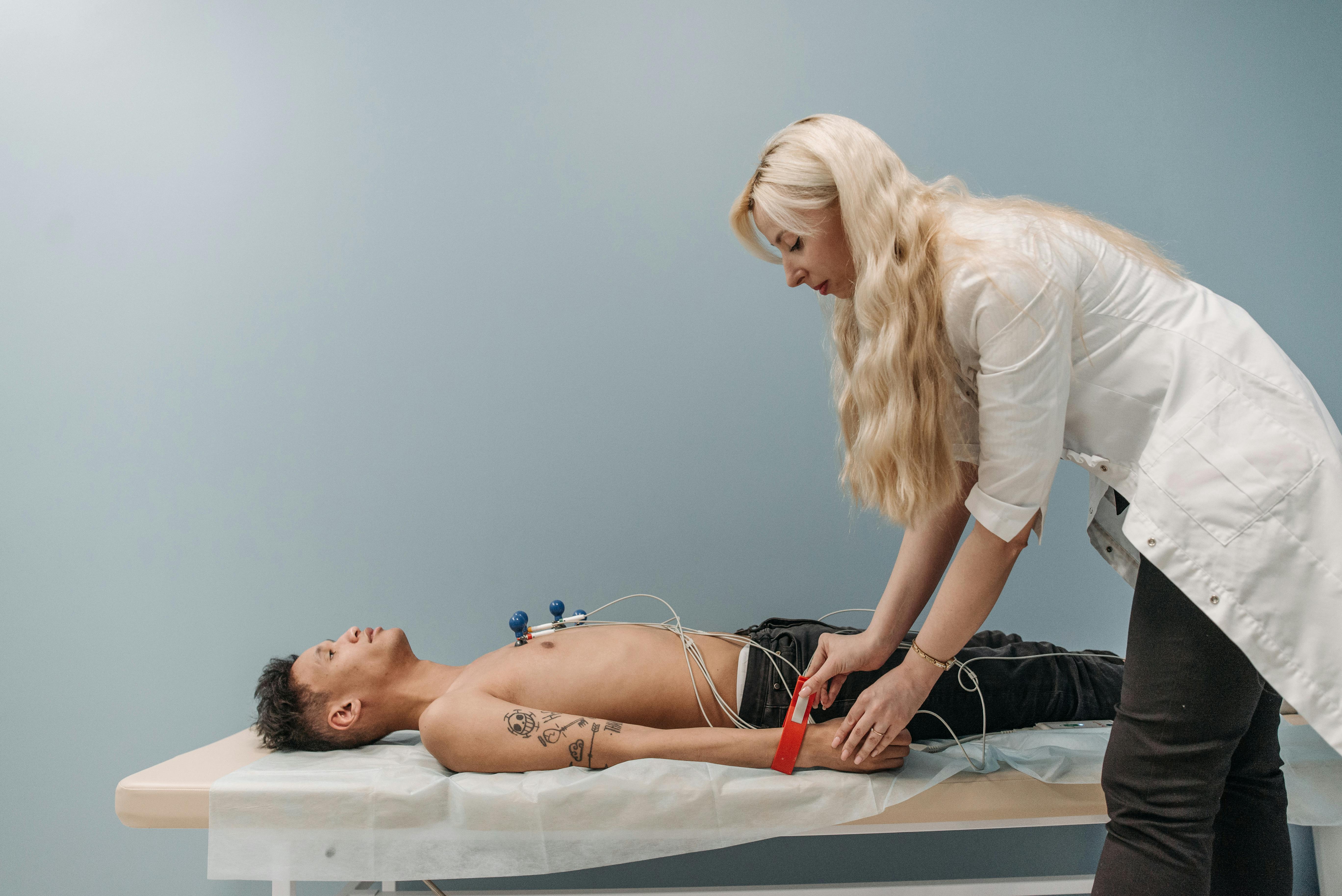 Free A Man Lying on the Bed Stock Photo